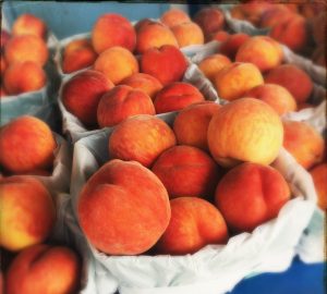 baskets of ripe peaches in Winfield BC